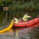 Medewerkers van de NAM ruimen begin oktober de vervuiling in het afwateringskanaal op. Foto: Aarchief DvhN