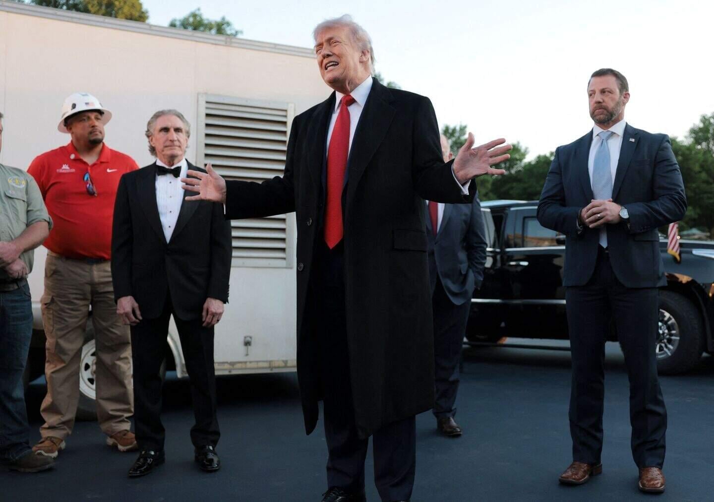 De Amerikaanse president Donald Trump (midden). 