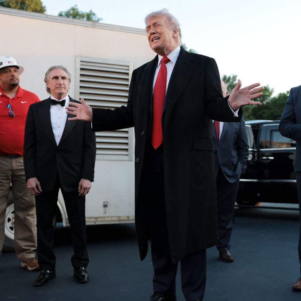 De Amerikaanse president Donald Trump (midden). 