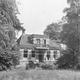 De in 1959 afgebroken pastorie, met in de schuur het stoffelijk overschot.