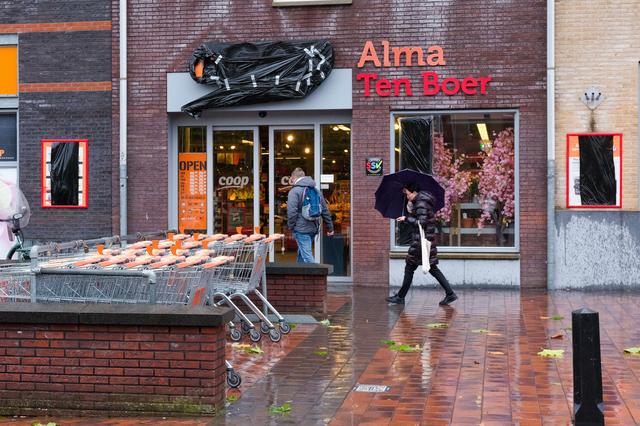 De naam van supermarkt Coop is niet meer te zien.