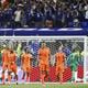 Teleurstelling bij de spelers van Nederland nadat Japan in de slotfase de 2-2 heeft gemaakt.