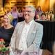 Wethouder Harry Stomphorst op zijn afscheidsreceptie met naast hem zijn vrouw Ria